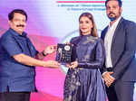 Falguni Peacock and Shane Peacock receive the Luxury Fashion Designer award during the Times Retail Icon Awards 2017