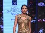 ​ A model displays designer Rocky S’s collection