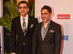 Ajay Bijli and Sanjeev Bijli walk the red carpet