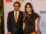 Ajay Arora and Simone Arora walk the red carpet