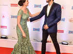 Evelyn Sharma and Mohit Marwah greet each other as they walk the red carpet