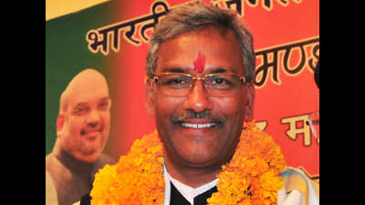 Defying ‘jinx’, Trivendra Singh Rawat moves to official CM bungalow