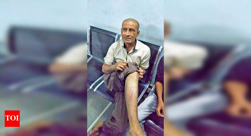 Cop booked for beating up passenger | Vadodara News - Times of India