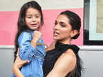 Deepika poses with a little kid