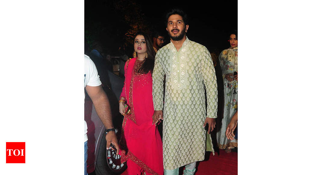 Dulquer Salmaan Poses With Wife Amal Sufiya At The Special Screening Of  Chup: Revenge Of The Artist | IWMBuzz