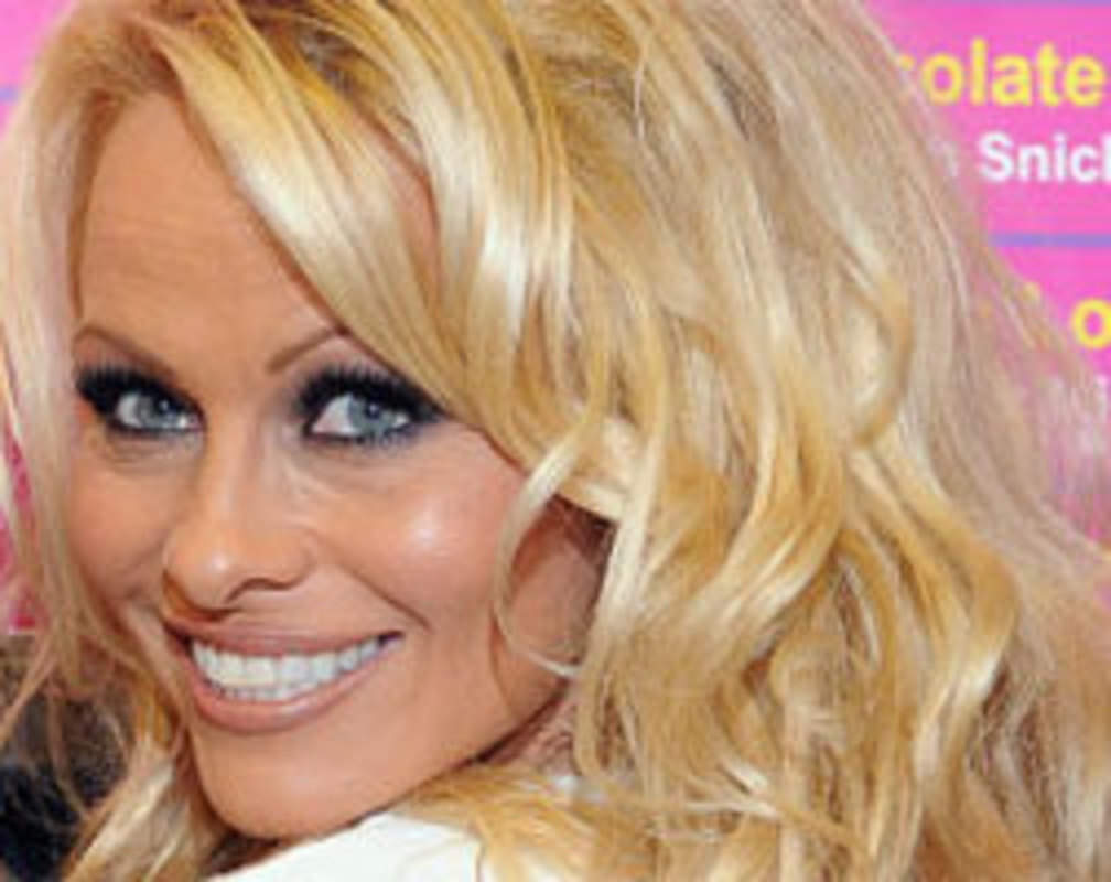 
Pamela Anderson asked to cover up!
