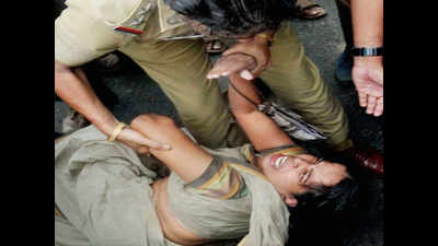Kerala cops thrash suicide victim's mother