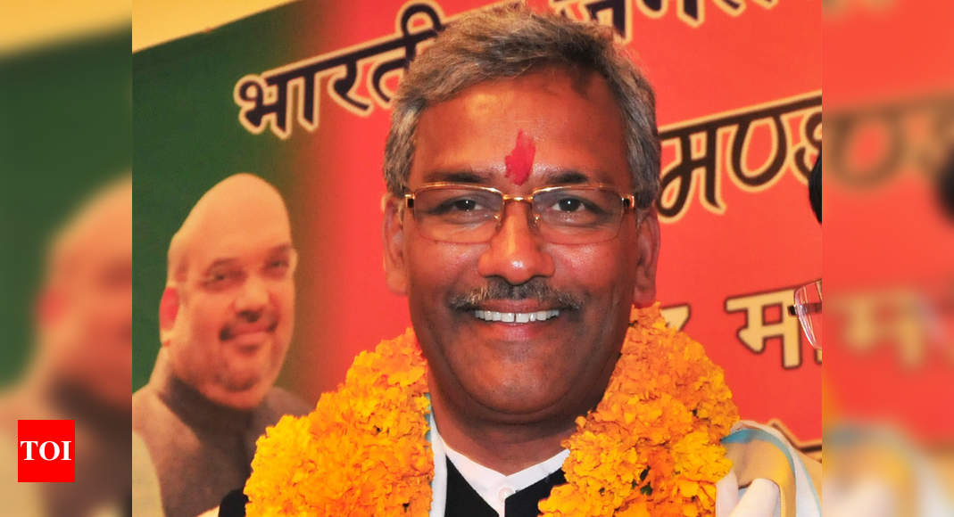 Trivendra Singh Rawat: Rawat to withdraw 'political cases ...