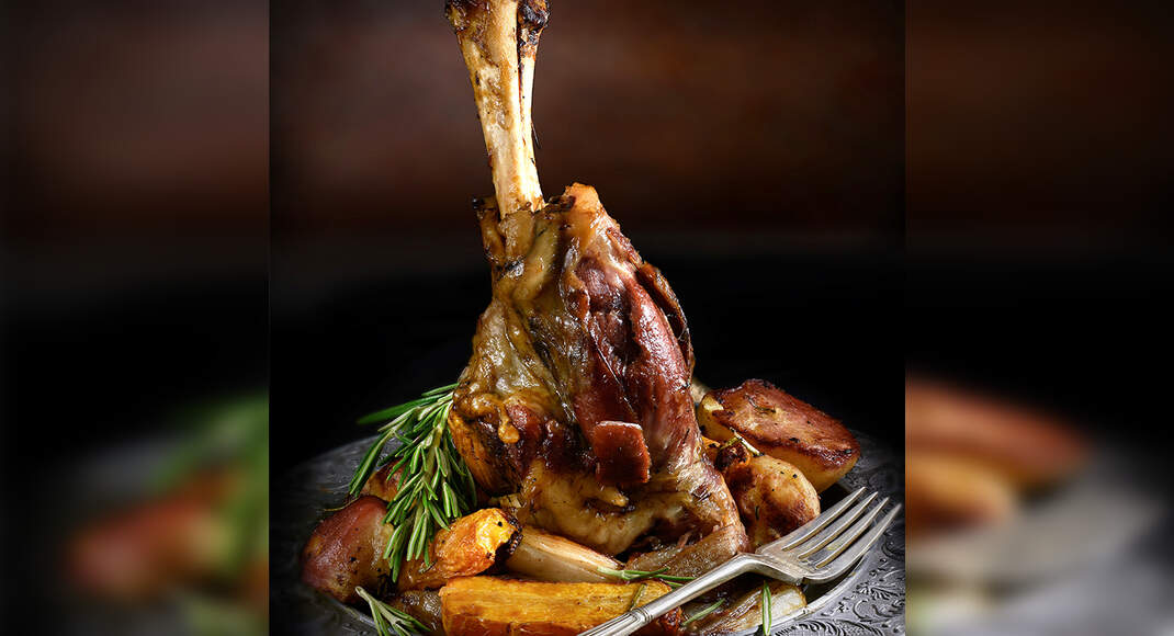 Braised Leg of Lamb with Garlic Root Vegetables and Red Wine Sauce