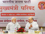 Photos of Narendra Modi and Amit Shah