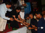 Akshay Kumar shaking hand with fans