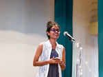 A participant speaks at Konverse Poetry Slam Talk-A-Thon