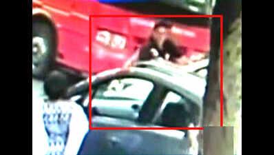 Caught on camera: Cop tries to run over man he owed money to