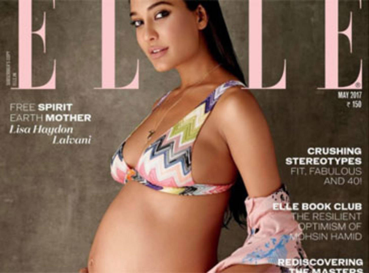 Lisa Haydon flaunts baby bump on magazine cover