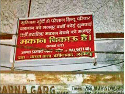 Police ask man to remove communally sensitive poster