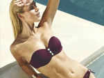 Kirsty Rose Heslewood enjoys sunbath by poolside