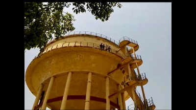 Four climb water tank opposing Vrindavan council merger in Mathura
