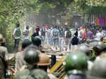 Students and police clash outside SP College