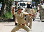 A police officer in action during SP College protest