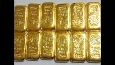 Tailor nabbed at KIA with 12 gold biscuits