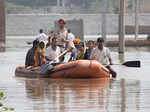 NDRF personnel rescue local people
