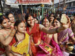 Married women pose for a selfie