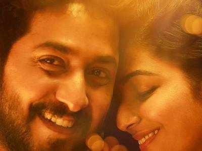 Vineeth Sreenivasan and Rajisha Vijayan's stills from Oru Cinemakkaran look 'aww'dorable!