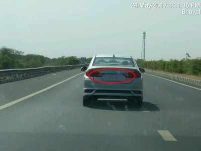 without no plate car running on National Highway 1