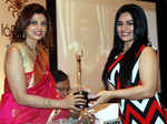 Varsha Usgaonkar presenting awards to Renee