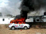 Police vehicle torched by farmers