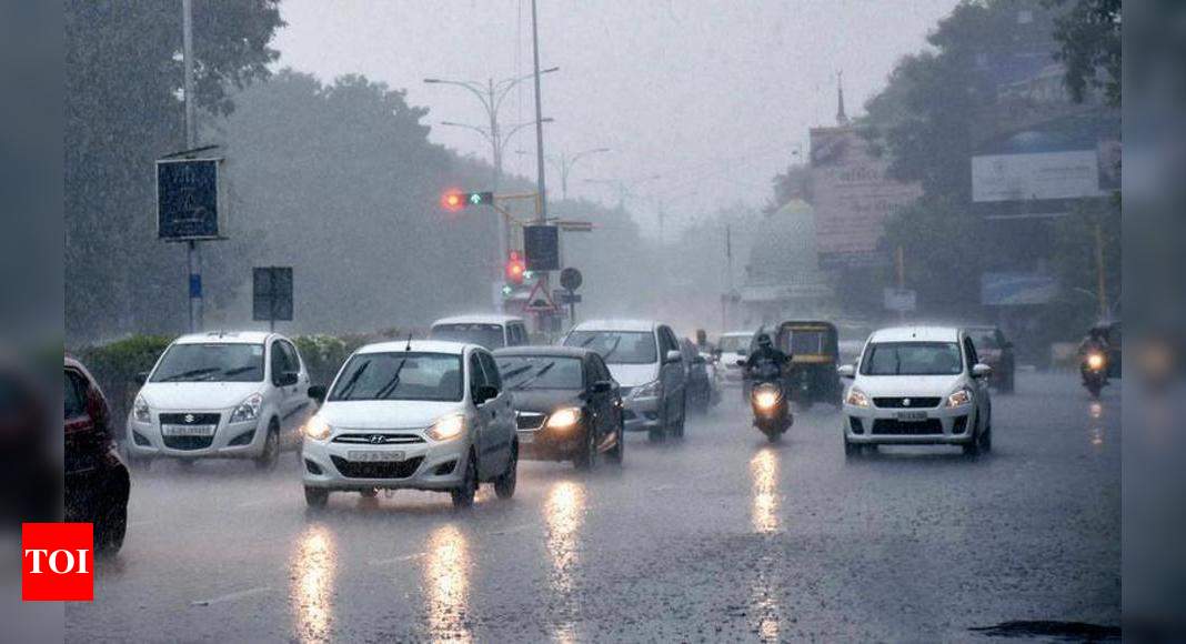 Pre-monsoon showers lash Surat | Surat News - Times of India