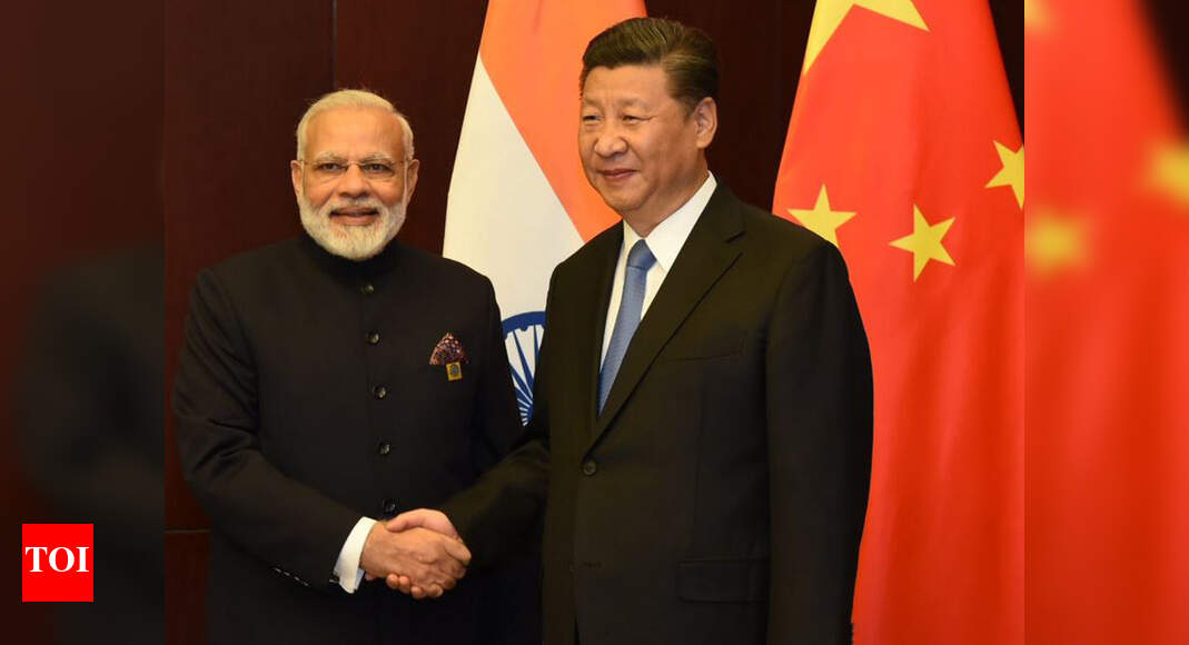 Narendra Modi: PM Modi meets Chinese President Xi Jinping on SCO ...