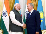 Narendra Modi greets the Kazakh President Nursultan Nazarbayev