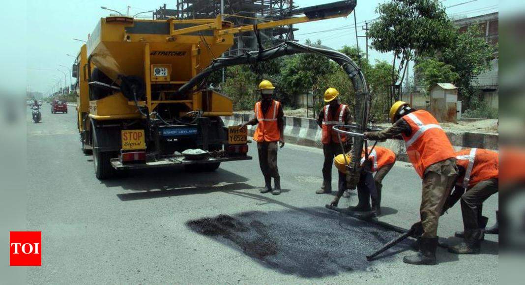 Patching machine to repair Noida roads - Photo