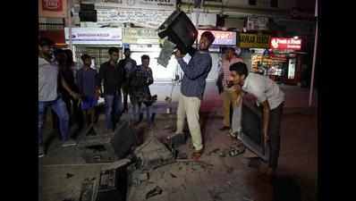 Shattered cricket fans smash TV sets
