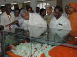 A devotee pays his last respects
