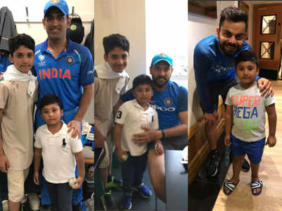 Kohli, Yuvraj and Dhoni pose for pictures with Azhar Ali’s kids