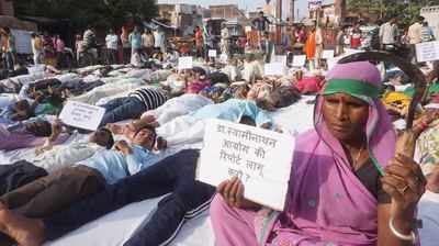 Farmers perform Shavasana on road in Mirzapur district