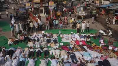 Farmers perform Shavasana on road in Mirzapur district