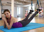 Miranda Kerr does yoga to stay fit
