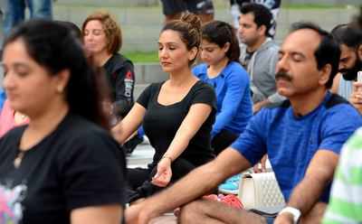 Private cos bend it in style, hop onto yoga bandwagon