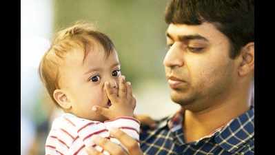 A chat with youngest single father who adopted a child