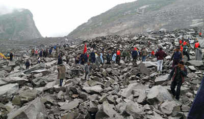 Five killed, 120 missing as landslide buries mountain village in China