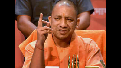Yogi presents UP government's 100 days report cards