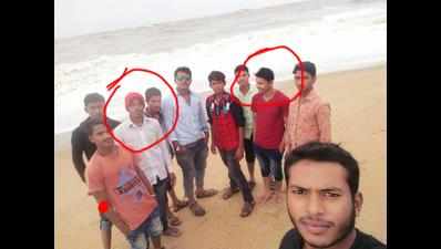 Two youths posing for selfie in Arabian Sea near Ullal washed away