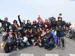 Lady bikers pose for a group photograph
