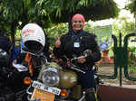 A lady biker gestures during a bike rally