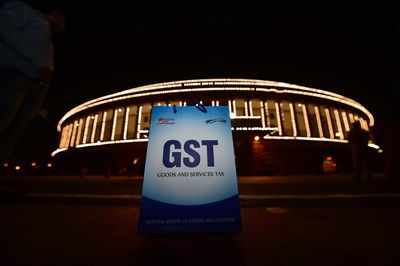 GST: India eyes economy, BJP hopes poll win