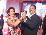 Host MaryKay Carlson dances with Rajiv Pratap Rudy