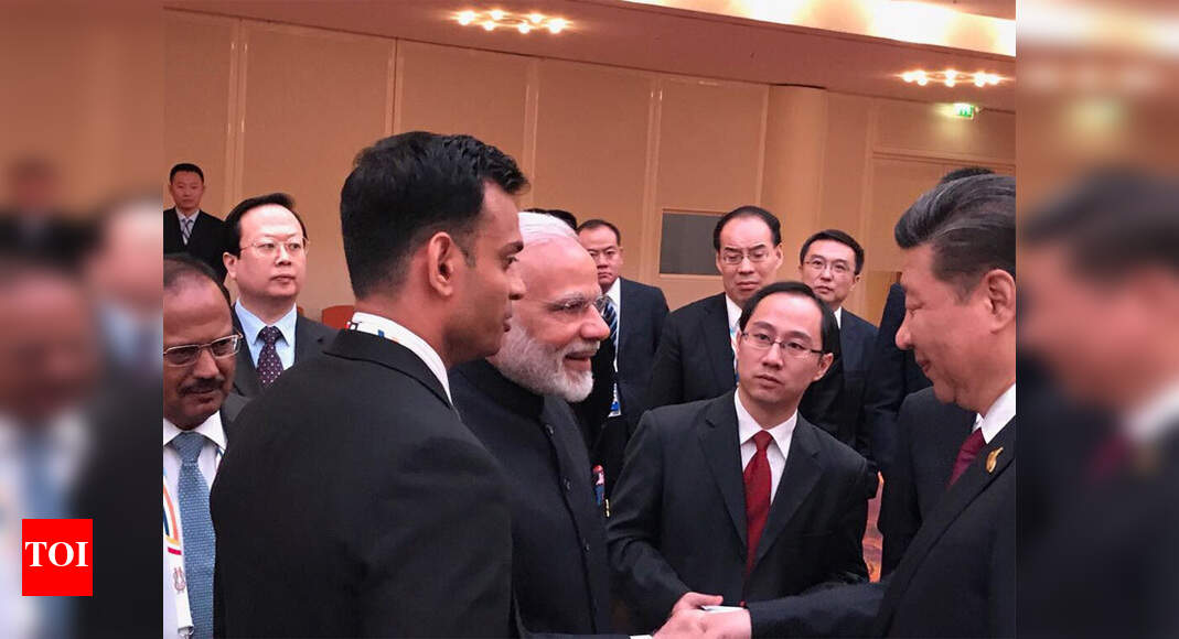 Narendra Modi: Amid India-China border standoff, Modi and Xi meet in ...